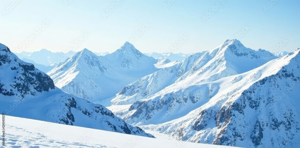 A dense layer of snow covering the mountain ridges and peaks in Alaska, alaska, snow, snowy landscape A dense layer of snow covering the mountain ridges and peaks in Alaska, alaska, snow, snowy landscape