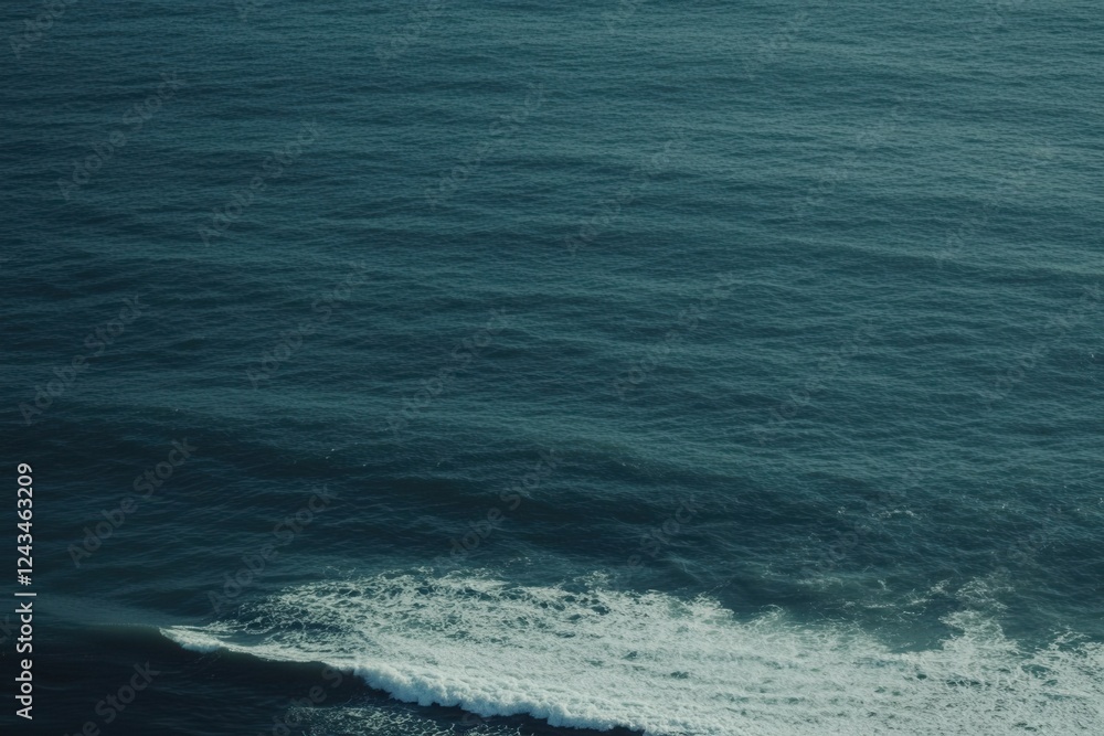 Calm Ocean Waves with Gentle Ripples and White Foam Surface Calm Ocean Waves with Gentle Ripples and White Foam Surface
