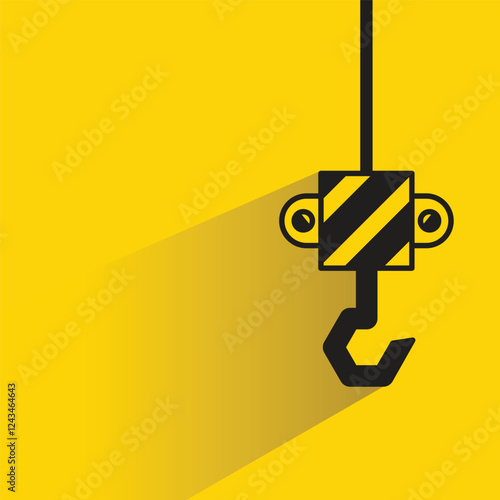 pulley and crane hook icon with shadow on yellow background