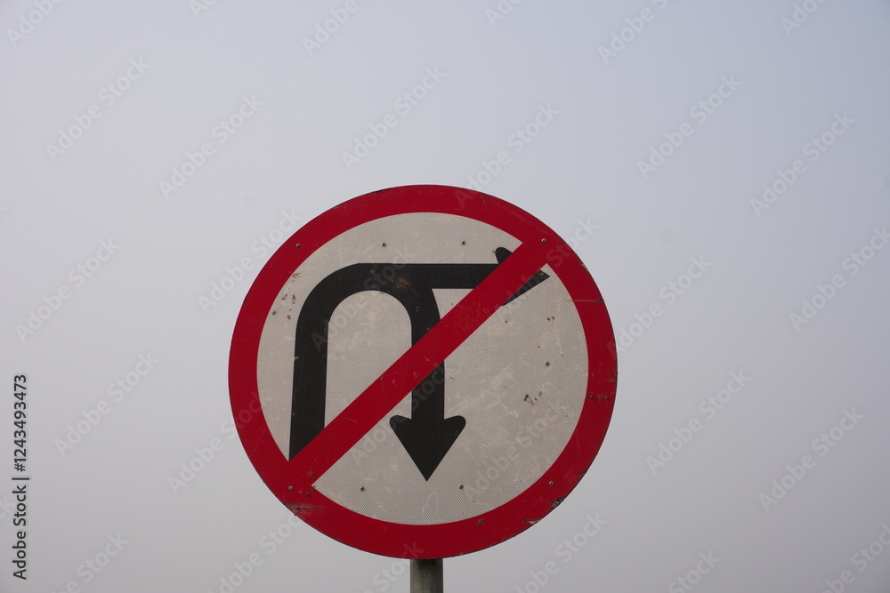 No U-Turn traffic sign which indicates that making a U-turn is prohibited at that location No U-Turn traffic sign which indicates that making a U-turn is prohibited at that location