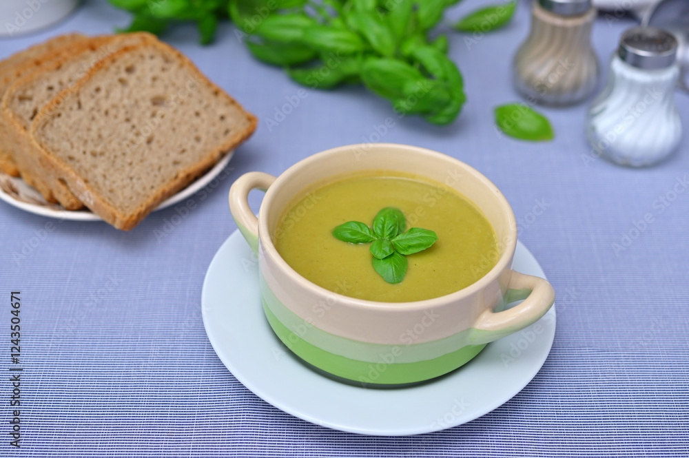 diet broccoli puree soup in a bowl close-up diet broccoli puree soup in a bowl close-up