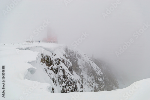 snowy landscape with rocks in Snezne Kotly on the Czech-Polish border photo