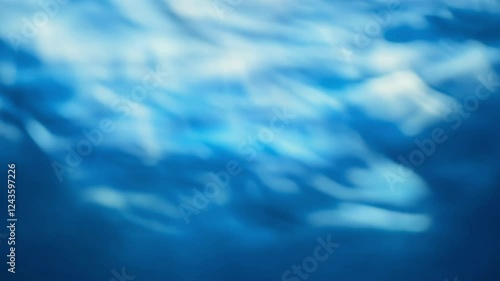 Blurred blue abstract background with soft, flowing shapes and a serene vibe. Perfect for copy space or design projects.