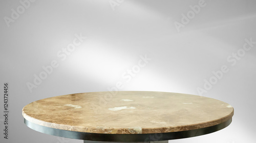 Round marble table top with abstract shadow drop on white wall background for mockup product display photo