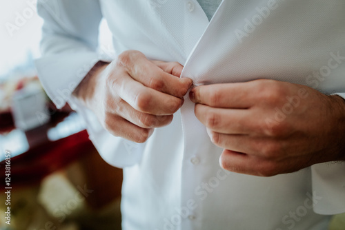 Wallpaper Mural Buttoning Up – Preparing for a Formal Occasion Torontodigital.ca