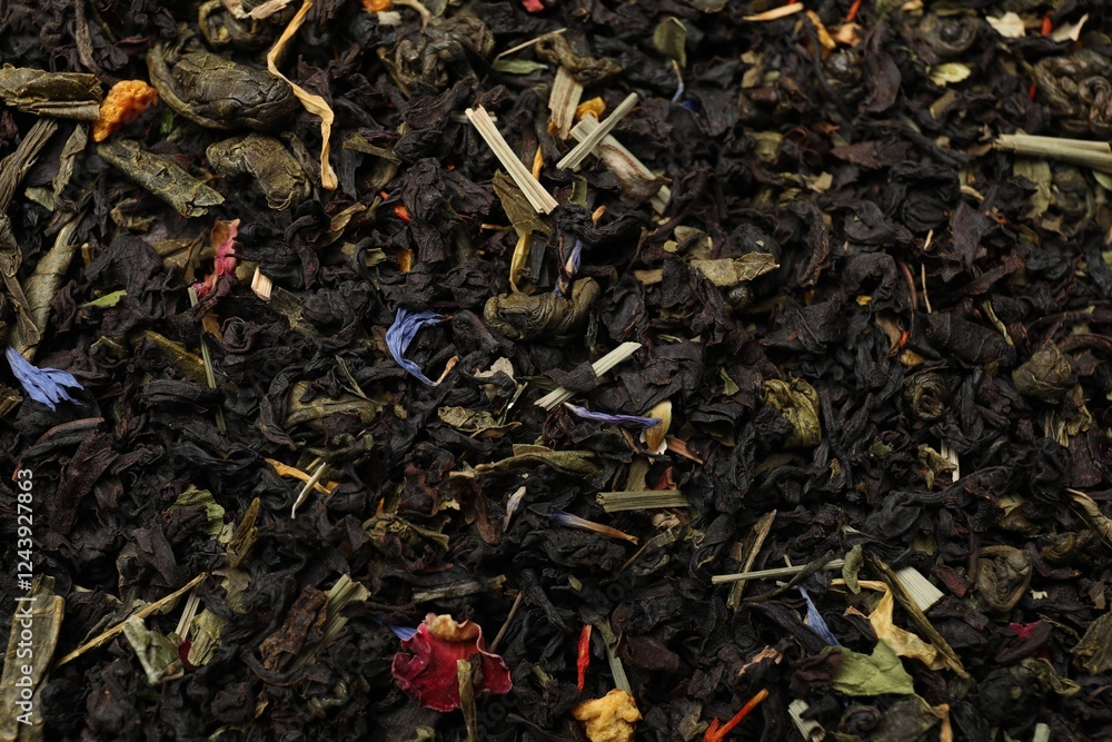 Pile of dry tea leaves as background, top view Pile of dry tea leaves as background, top view