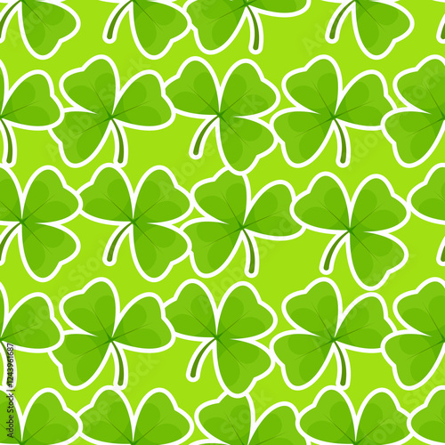 Seamless pattern of shamrocks with white outline on soft green background for St. Patrick's Day