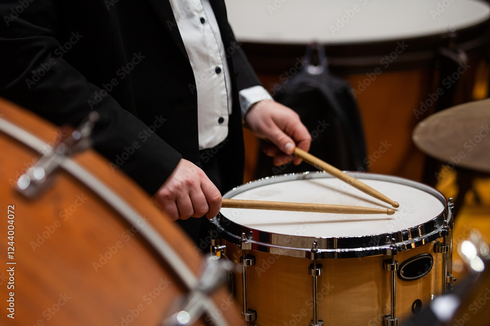Hands of a musician playing a drum Hands of a musician playing a drum
