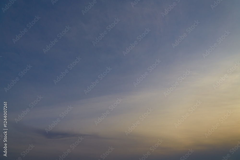 Magical atmosphere of a sunset with a misty sky and cirrus clouds, sunset reflections in the sky, hazy sky with clouds at sunset, sky in pastel shades with sunlight and clouds. Magical atmosphere of a sunset with a misty sky and cirrus clouds, sunset reflections in the sky, hazy sky with clouds at sunset, sky in pastel shades with sunlight and clouds.
