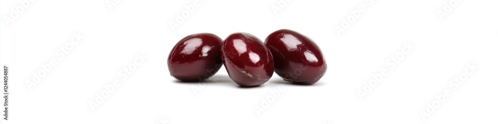 Two red beans sitting side by side, possibly in a garden or on a table Two red beans sitting side by side, possibly in a garden or on a table