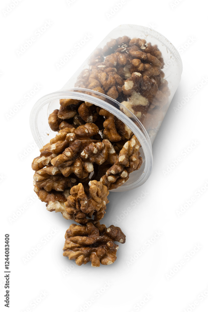 Obraz premium Walnuts in a plastic cup isolated on transparent background
