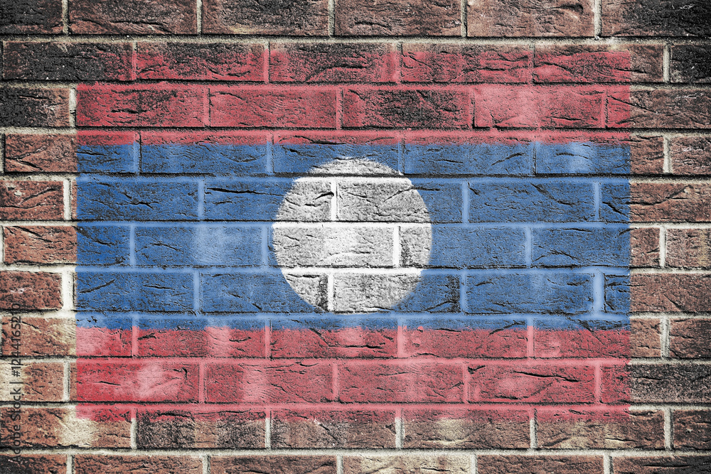 Fototapeta premium Laos flag on brick wall background