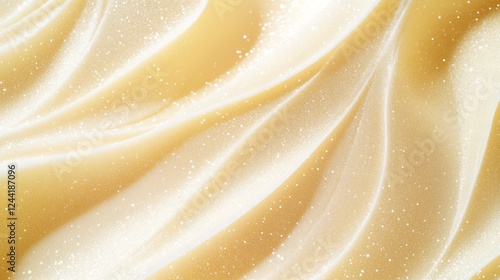 A gold and white background with a swirl of glitter