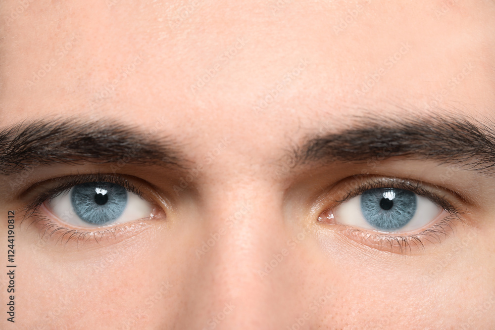 Obraz premium Closeup view of man with blue eyes