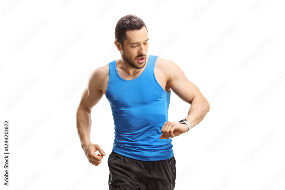 Man in sportswear running towards the camera and looking at his smartwatch Man in sportswear running towards the camera and looking at his smartwatch