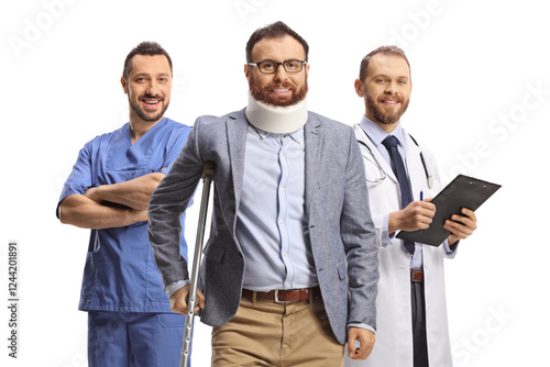 Doctors with an injured man wearing a cervical collar photo