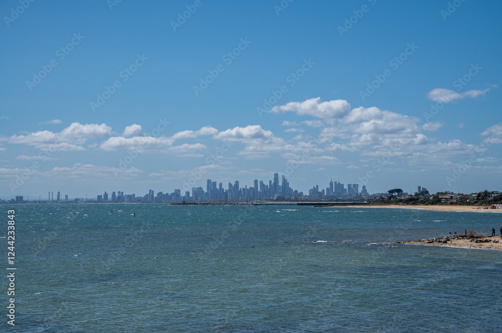Melbourne, Australia, View from Brighton Beach Gardens towards Holloway Beach and Brighton Beach with Melbourne CBD in the distance Melbourne, Australia, View from Brighton Beach Gardens towards Holloway Beach and Brighton Beach with Melbourne CBD in the distance