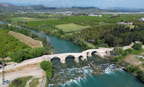 Koprucay Bridge ( Aspendos Bridge ), located in Antalya, Turkey, was built during the Seljuk period. photo