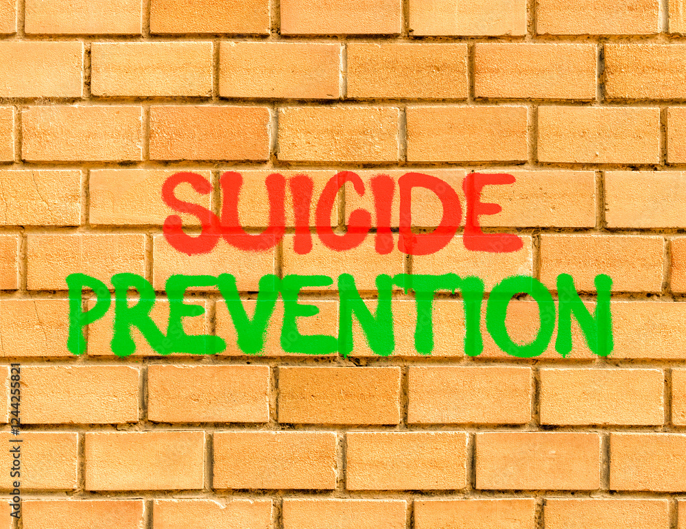 Suicide prevention symbol. Concept words Suicide prevention on beautiful brick wall. Beautiful brick wall background. Psychological and suicide prevention concept. Copy space. Suicide prevention symbol. Concept words Suicide prevention on beautiful brick wall. Beautiful brick wall background. Psychological and suicide prevention concept. Copy space.