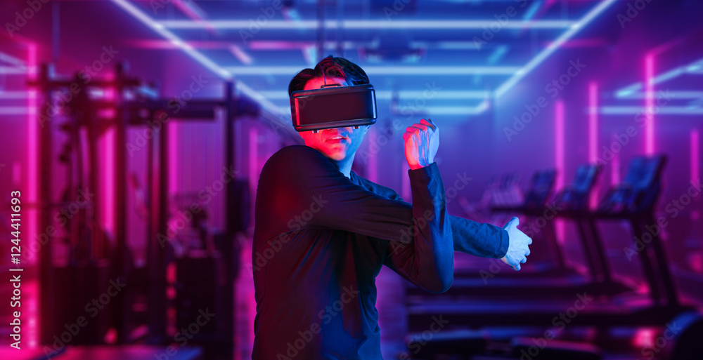 Asian man with VR glasses playing fitness while exercising at fitness. Male model using augmented reality and artificial intelligence to plan exercise plan. Technology innovation concept. Ingenuity. Asian man with VR glasses playing fitness while exercising at fitness. Male model using augmented reality and artificial intelligence to plan exercise plan. Technology innovation concept. Ingenuity.