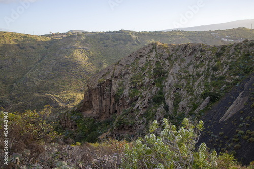 Rugged mountain landscape Bandama Caldera, Gran Canaria, with a prominent rock cliff or outcrop.