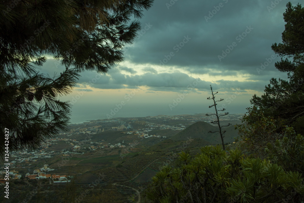 Mountainous landscape in Gran Canaria near Bandama, with a winding road and a small village.