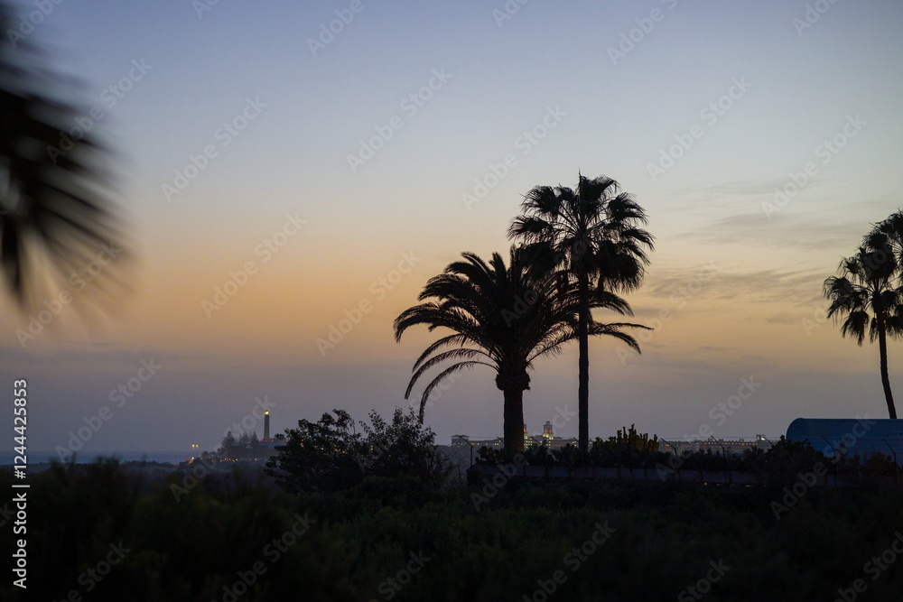 Faro de Maspalomas, Maspalomas Lighthouse in Gran Canaria at dusk or dawn.