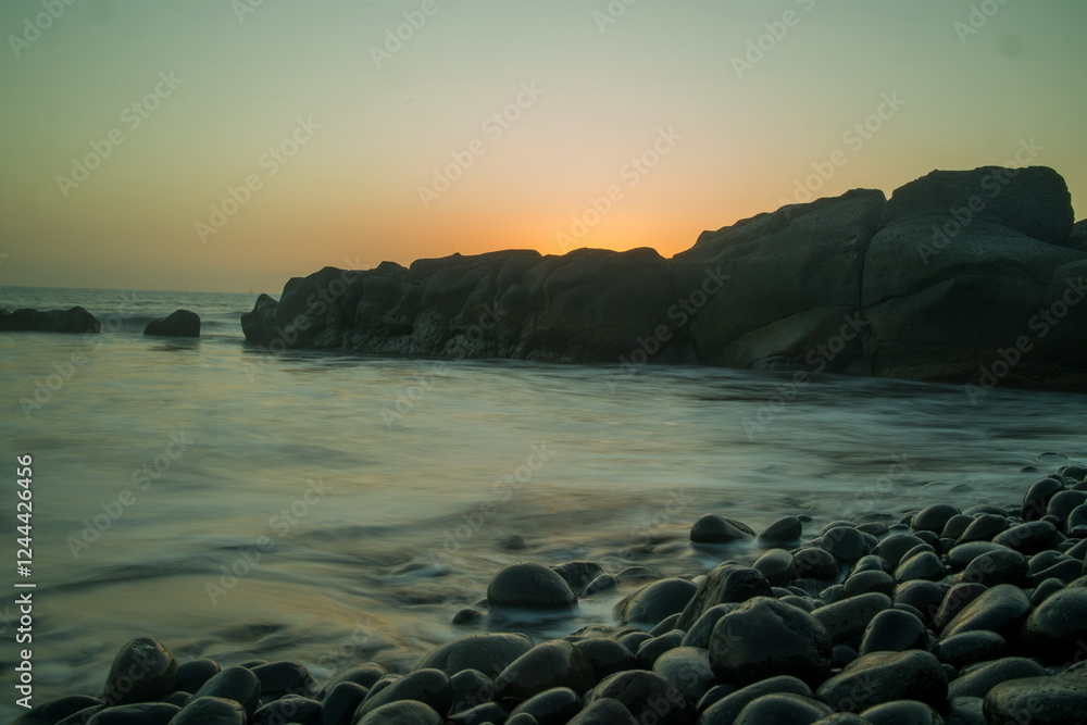 Rocky beach in Gran Canaria at sunset, sunrise.
