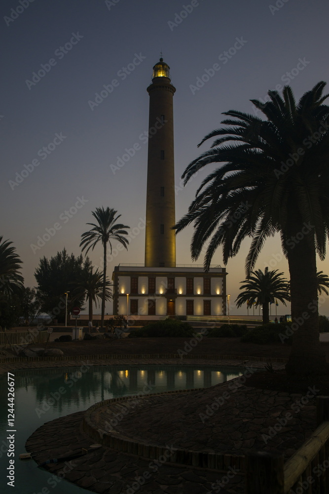 Faro de Maspalomas, Maspalomas Lighthouse in Gran Canaria at dusk or dawn.