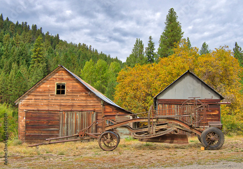 USA, Washington State, Kittitas County. Buildings and old rusty farming equip...