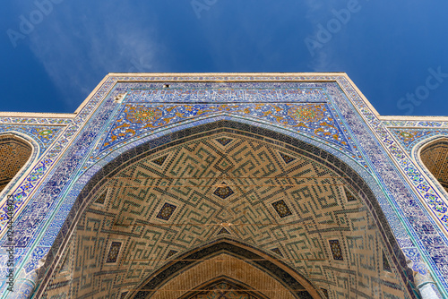 Inner portal of Ulugh Beg Madrasah, corner of inner courtyard photo