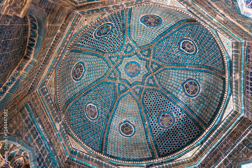 Decorated blue ceiling vault of an ancient mausoleum of Shah-i-Zinda photo