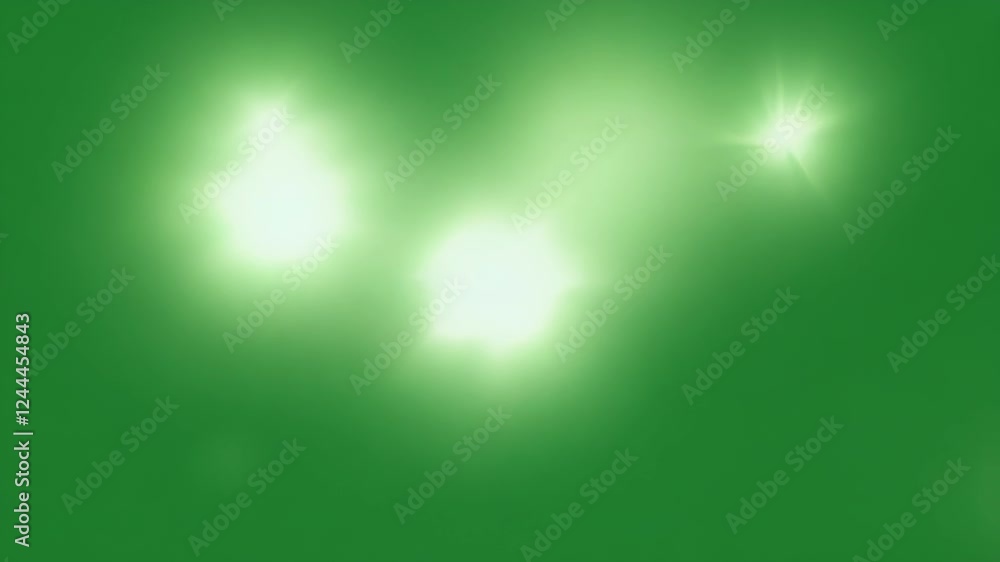 Irregular shapes of light dance playfully casting fleeting shadows on the green. Green screen chromakey Irregular shapes of light dance playfully casting fleeting shadows on the green. Green screen chromakey