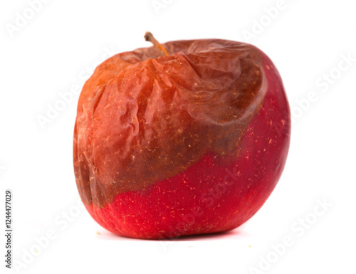 rotten raw apple on white background