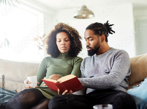 book woman man reading couple lifestyle young together happy smiling home love happiness caucasian relaxation togetherness sitting beautiful girlfriend boyfriend photo