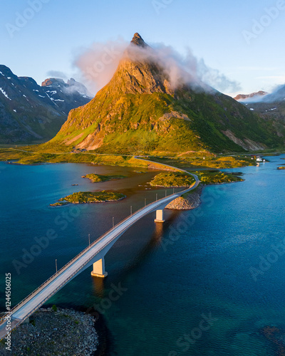 Midnight sun in Fredvang, surrounded by the majestic fjords of Lofoten Islands, Norway