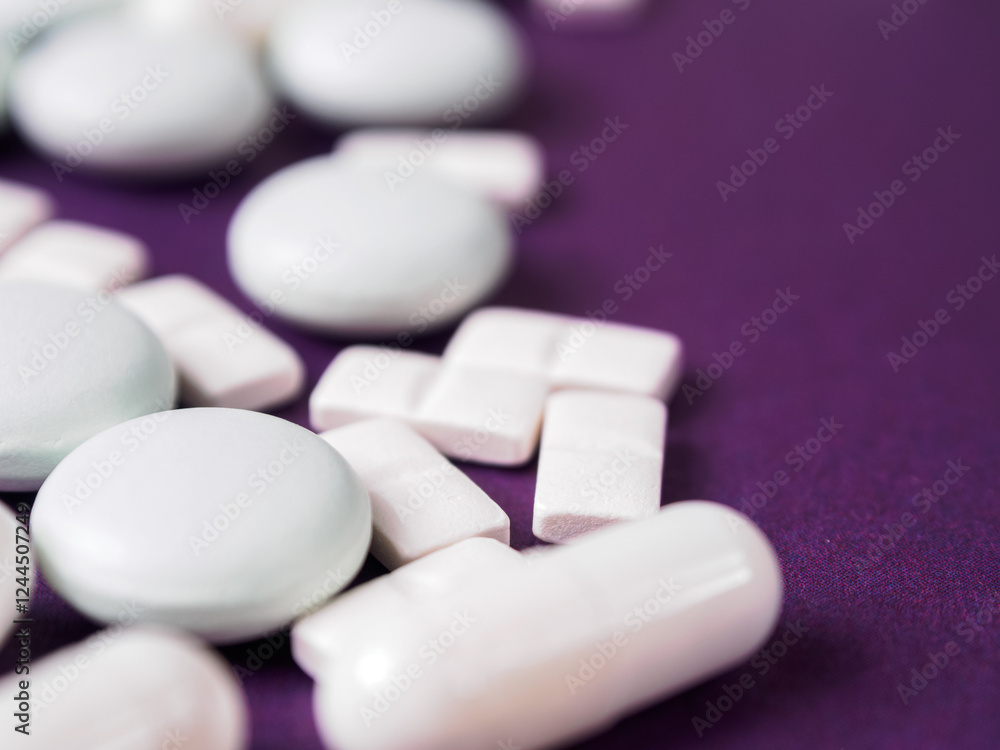 Macro Photography of Different Pills in the Background: A Visual Representation of Drugs and Their Role in the Pharmaceutical Industry. Macro Photography of Different Pills in the Background: A Visual Representation of Drugs and Their Role in the Pharmaceutical Industry.