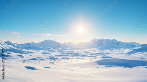 Wallpaper Mural A serene winter landscape features vast, untouched snowfields under a clear blue sky, with mountains majestically rising in the background. Torontodigital.ca