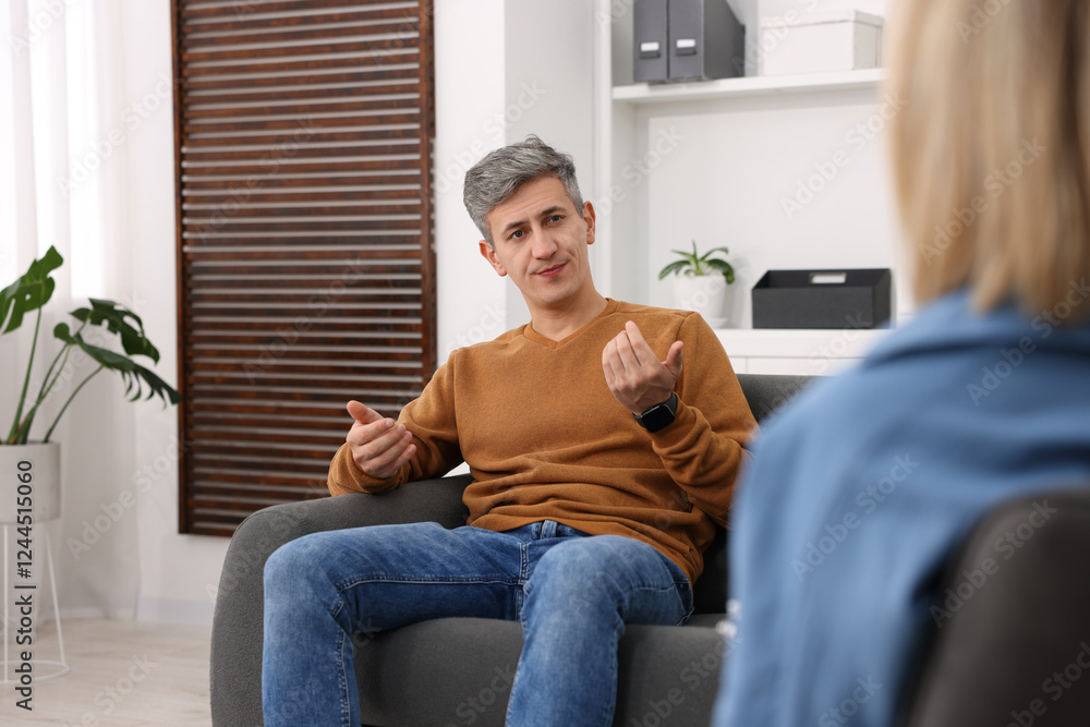 Professional psychologist working with patient in office Professional psychologist working with patient in office