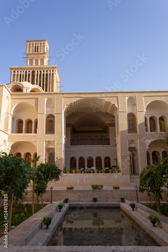 Aghazadeh Mansion  and its windcatcher was built during the Qajar dynasty and is located in Abarkooh, Iran. photo