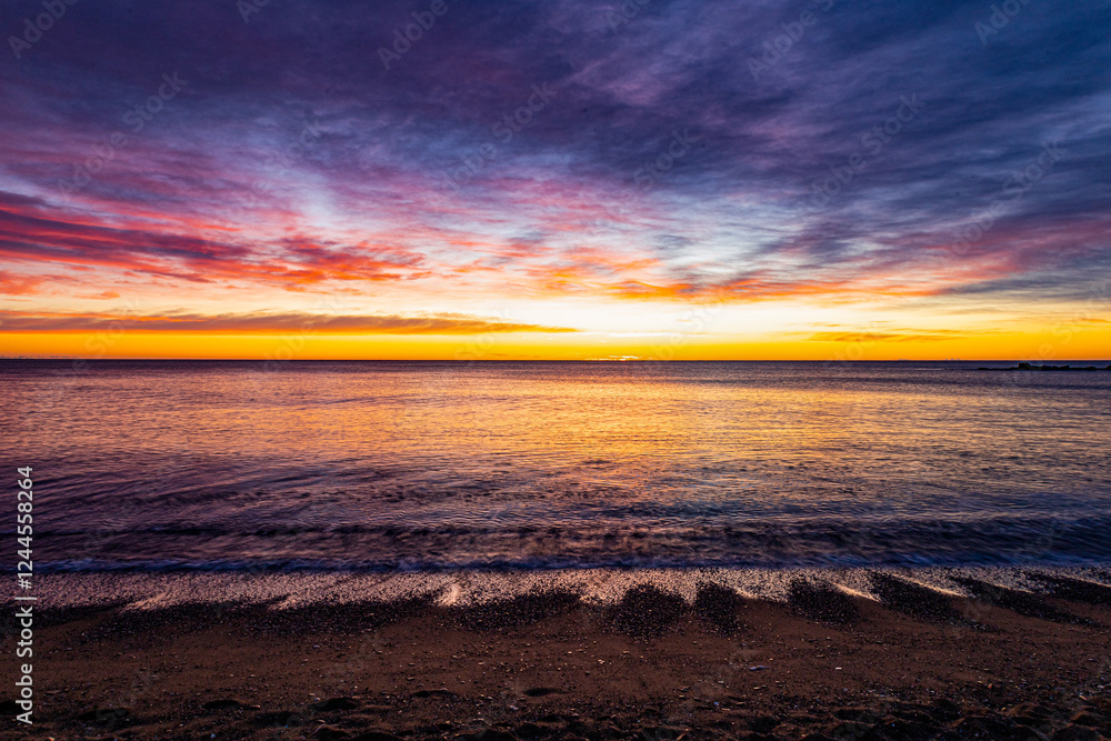 Beautiful sunrise on the Mediterranean Sea. Winter Barcelona. Spain in January. Beautiful sunrise on the Mediterranean Sea. Winter Barcelona. Spain in January.