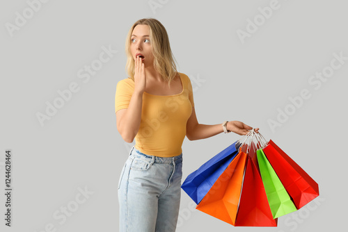 Emotional young woman with ...