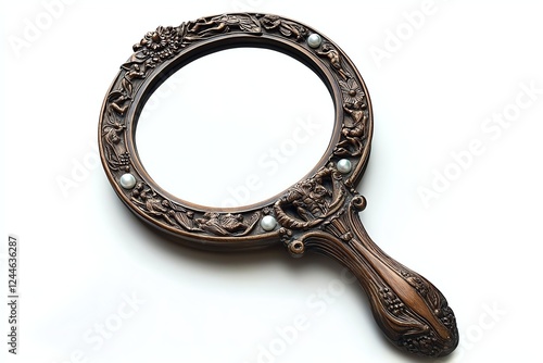 Bronze ornate antique hand mirror with mythological figures and pearl inlays isolated on white background photo