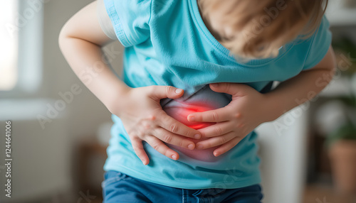 Young child experiencing abdominal discomfort. Stomach ache, upset belly, and possible constipation or dyspepsia. Crying and holding abdomen due to pain or discomfort from medical issues.