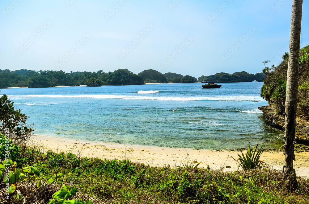 Crystal-Clear Water Lapping onto a White Sandy Shore Crystal-Clear Water Lapping onto a White Sandy Shore