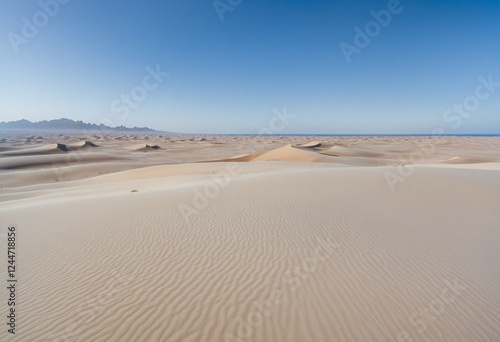 Breathtaking Desertscape Under a Radiant Blue Sky photo