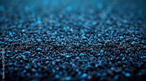 Close-up view of textured dark blue granular material