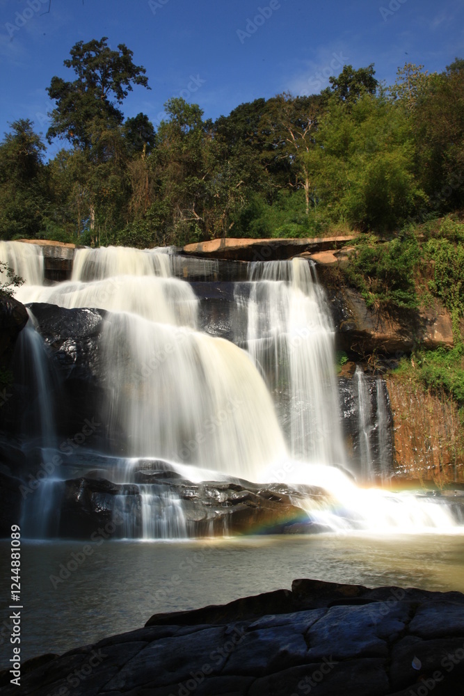 Obraz premium Tat Hueang Waterfall or Namtok Tat Hueang (Namtok Thai-Lao) the most beautiful of Phu Suan Sai, become the murder line between Thai-Laos. Phu Suan Sai National Park, Loei province THAILAND