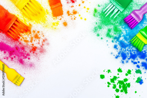 Creative Holi festival artistic arrangement with colorful powder splashes, paintbrushes, and abstract strokes, symbolizing joy, culture, and the celebration of vibrant festive traditions. photo