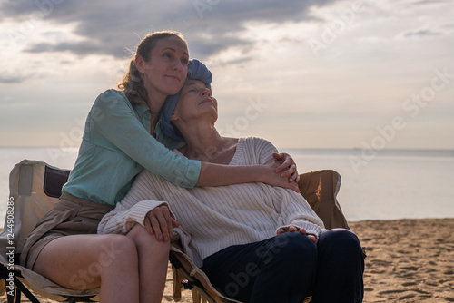 Moment friend support, resilience, and compassion, often associated with of battling cancer wearing a headscarf, a common symbol of strength among cancer patients undergoing treatment.